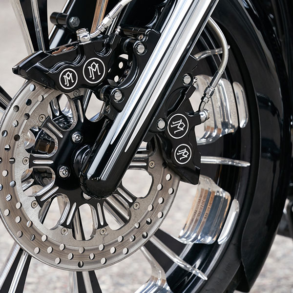 Black Horse Harley-Davidson® custom motorcycle front wheel close up