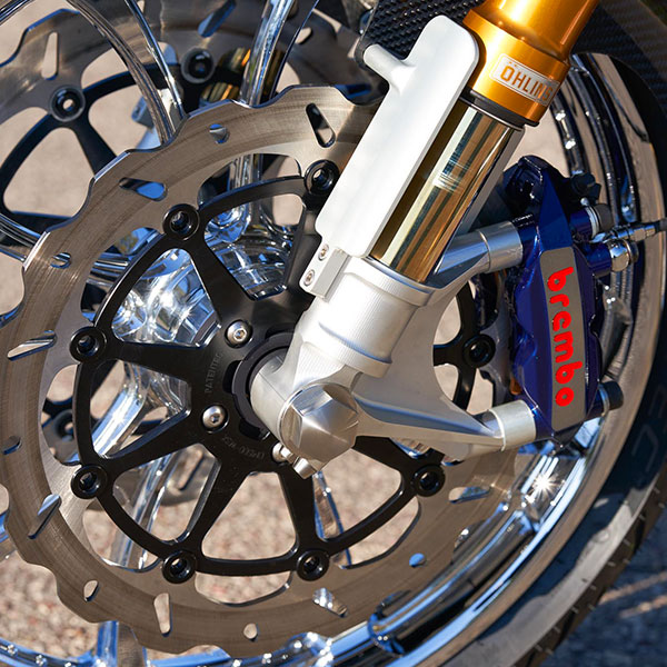 Lucky 13 motorcycle custom close up view of front wheel