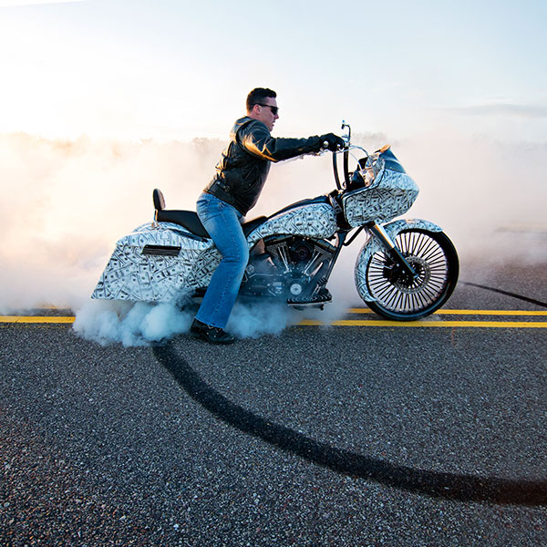 Money Bags custom Harley-Davidson® Road Glide® burn out