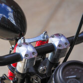 Crossbones Risers for Harley Davidson Springer models close-up.